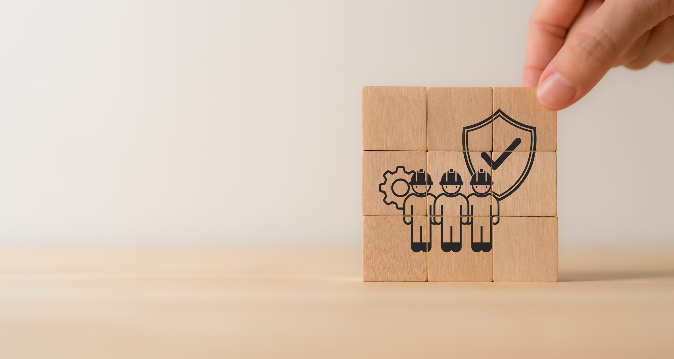 Work,Safety,Concept.,Wooden,Cube,Blocks,With,Icon,Of,Safety Tax time with wooden alphabet blocks, red alarm clock, calculator and pen on 1040 tax form background