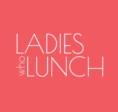 Tax time with wooden alphabet blocks, red alarm clock, calculator and pen on 1040 tax form background