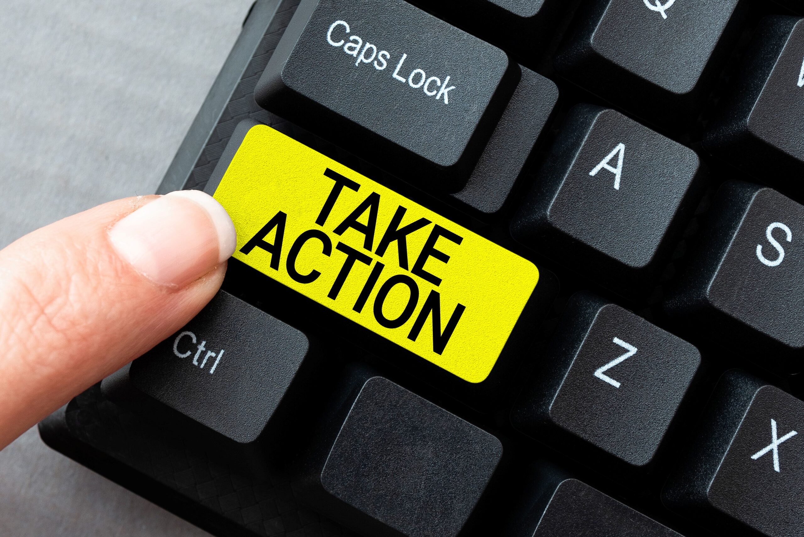 Tax time with wooden alphabet blocks, red alarm clock, calculator and pen on 1040 tax form background